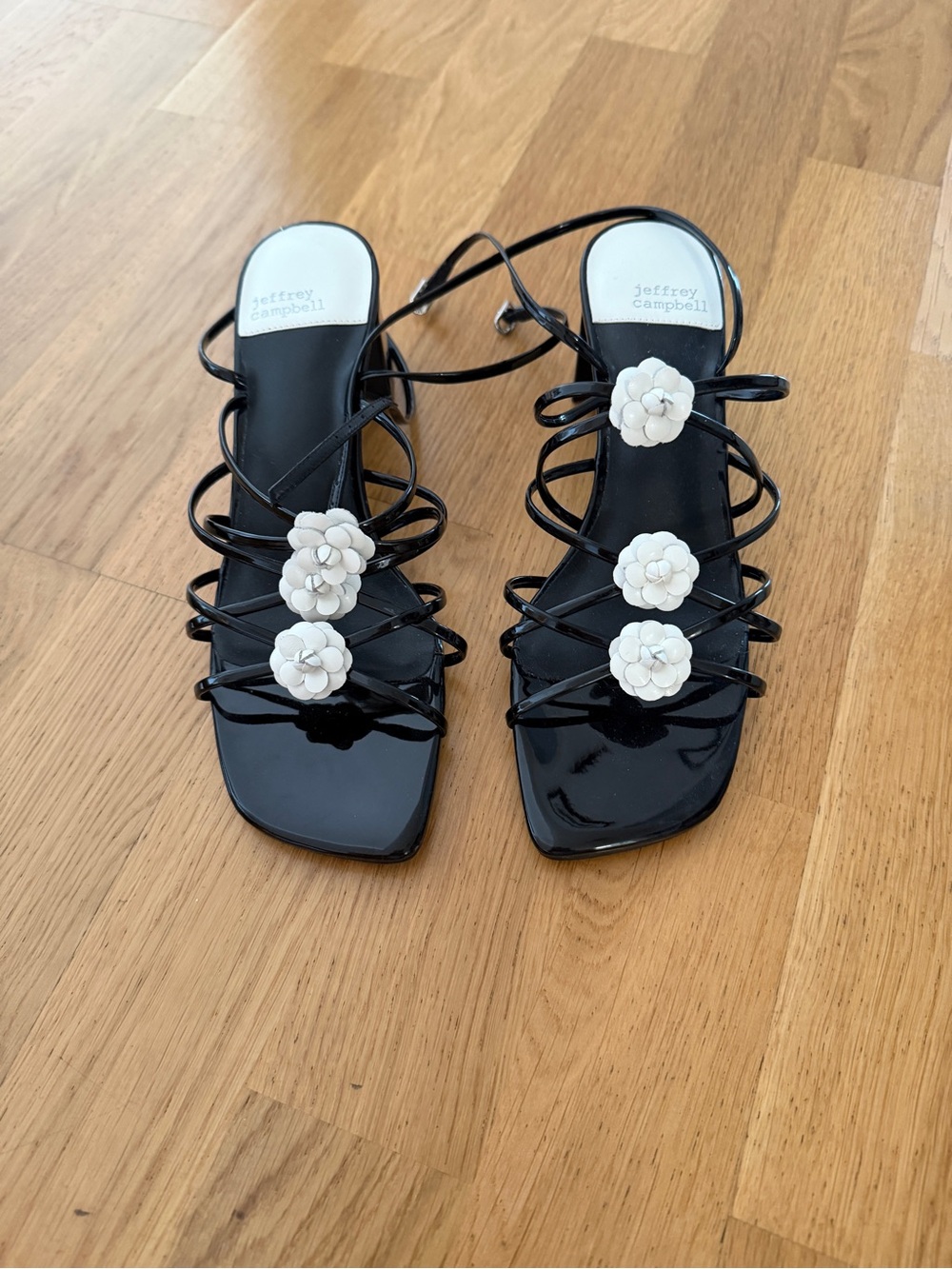 Jeffrey Campbell Black Strappy Sandals with White Floral Appliques